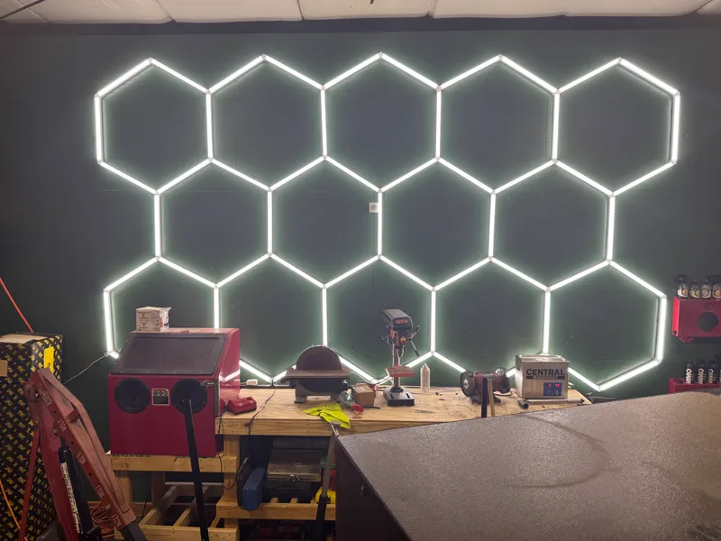 The hex LED wall over the fabrication bench.